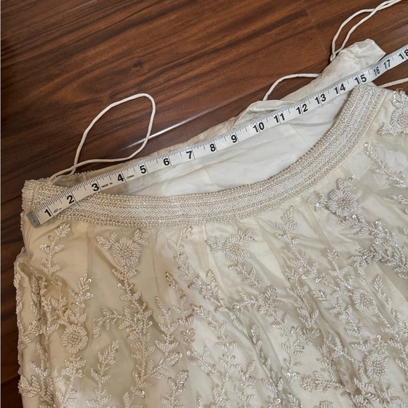 Extravagant Ivory Pearl Lehenga 🤍 - Picture 10 of 11